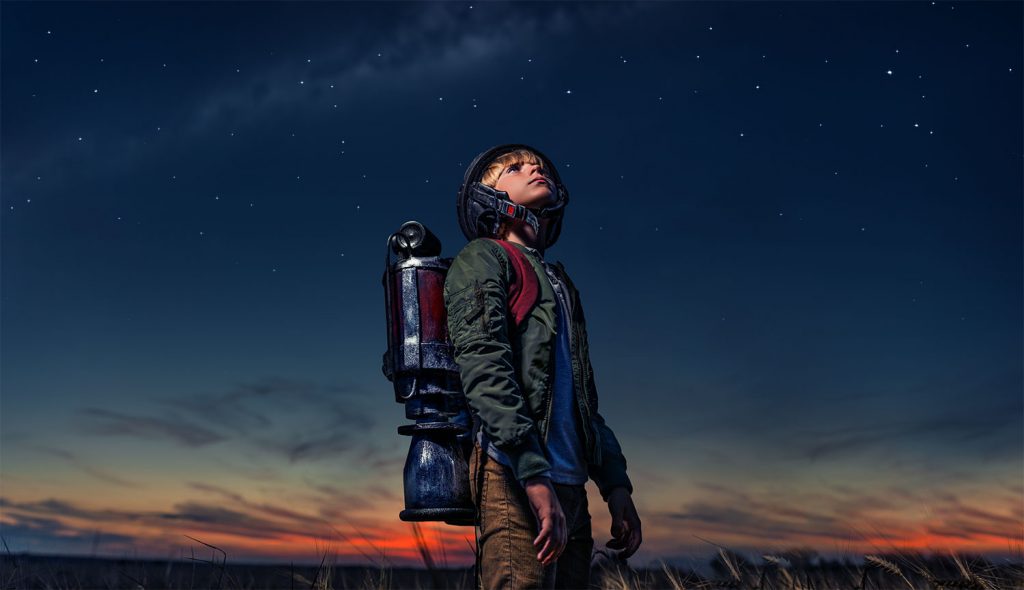 Boy looking at the sky How WIll Space Tourism Work ?